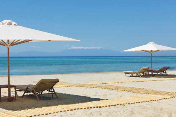 Reserved-Sun-Loungers-at-the-Beach-for-Porto-Sani-Guests.png